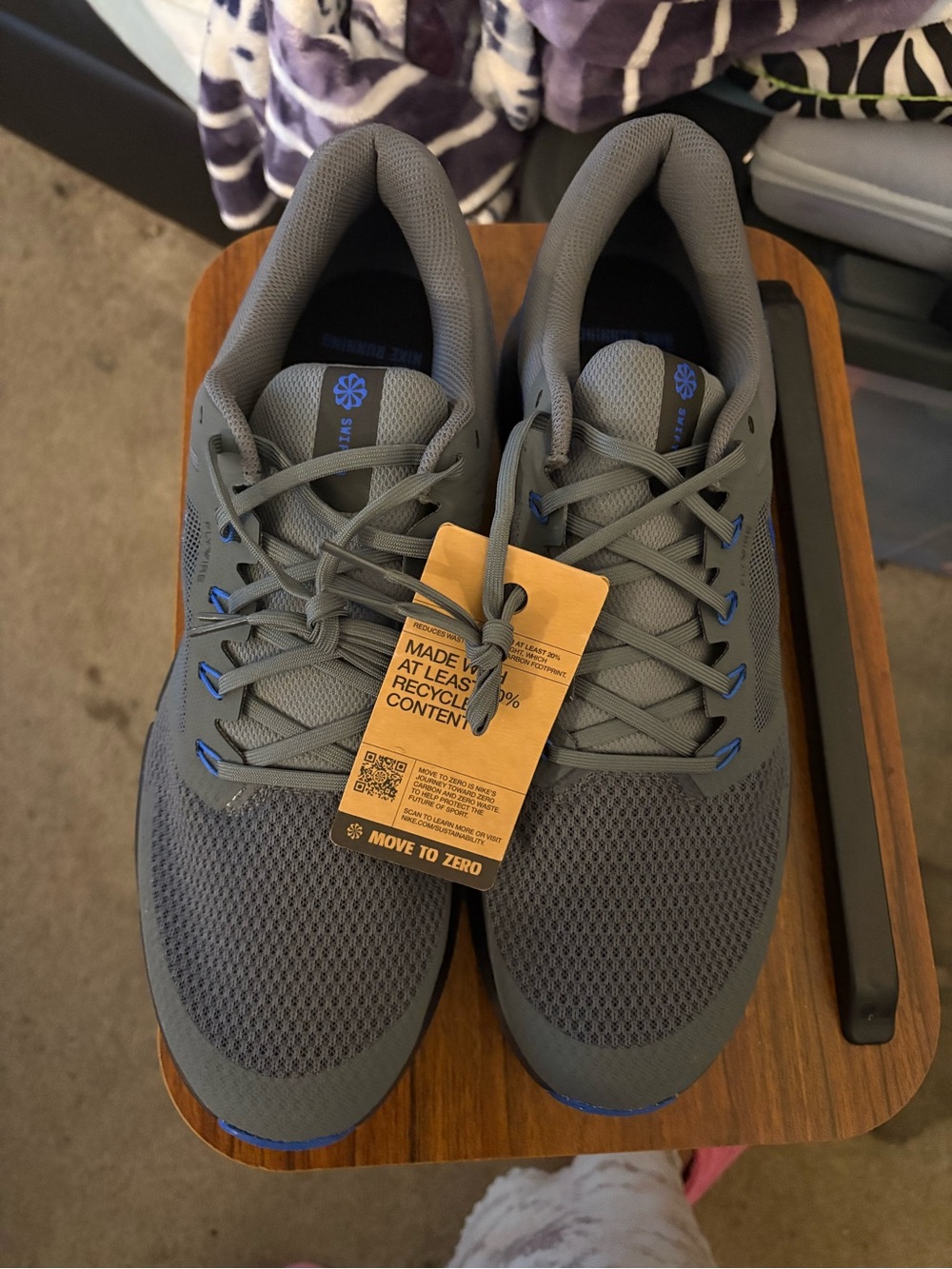 Nike Men's Gray Sneakers with Blue Accents